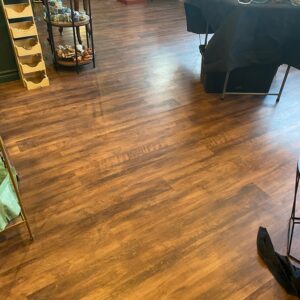 High-quality commercial flooring with a rich wood-look finish