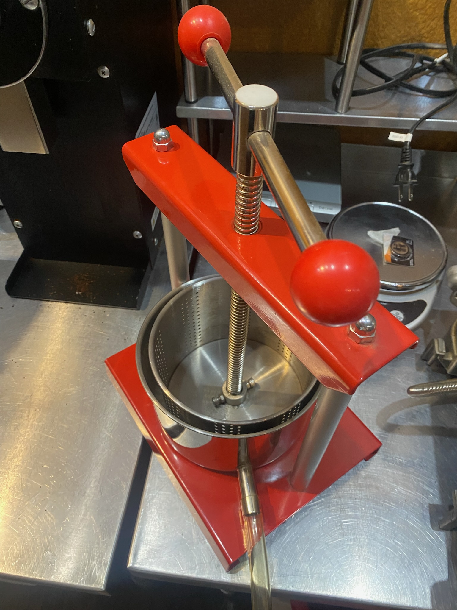 Smaller red twist-top tincture and juice press - Image 3