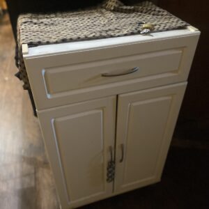 White locked cabinet