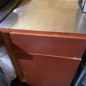 Custom Cabinet of drawers w/ stainless steel top (in back room)